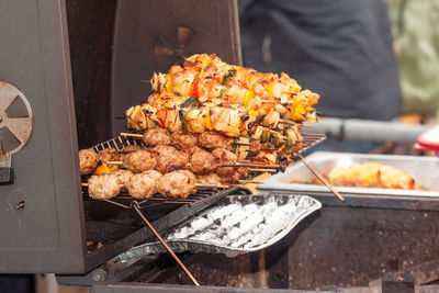 Close-up of meat on barbecue grill