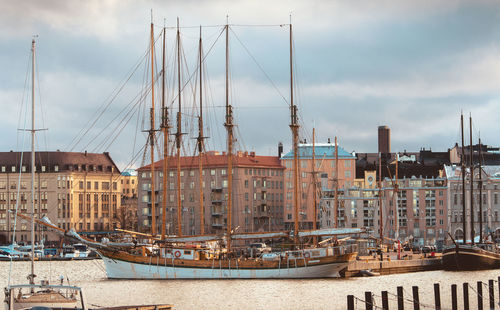 Boats moored at harbor