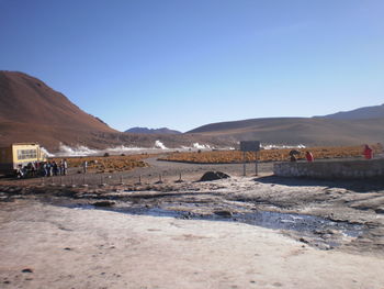 Scenic view of landscape at san pedro de atacama against clear sky