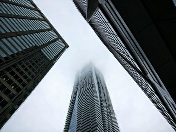 Low angle view of skyscrapers against sky