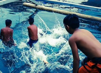 High angle view of man swimming in pool