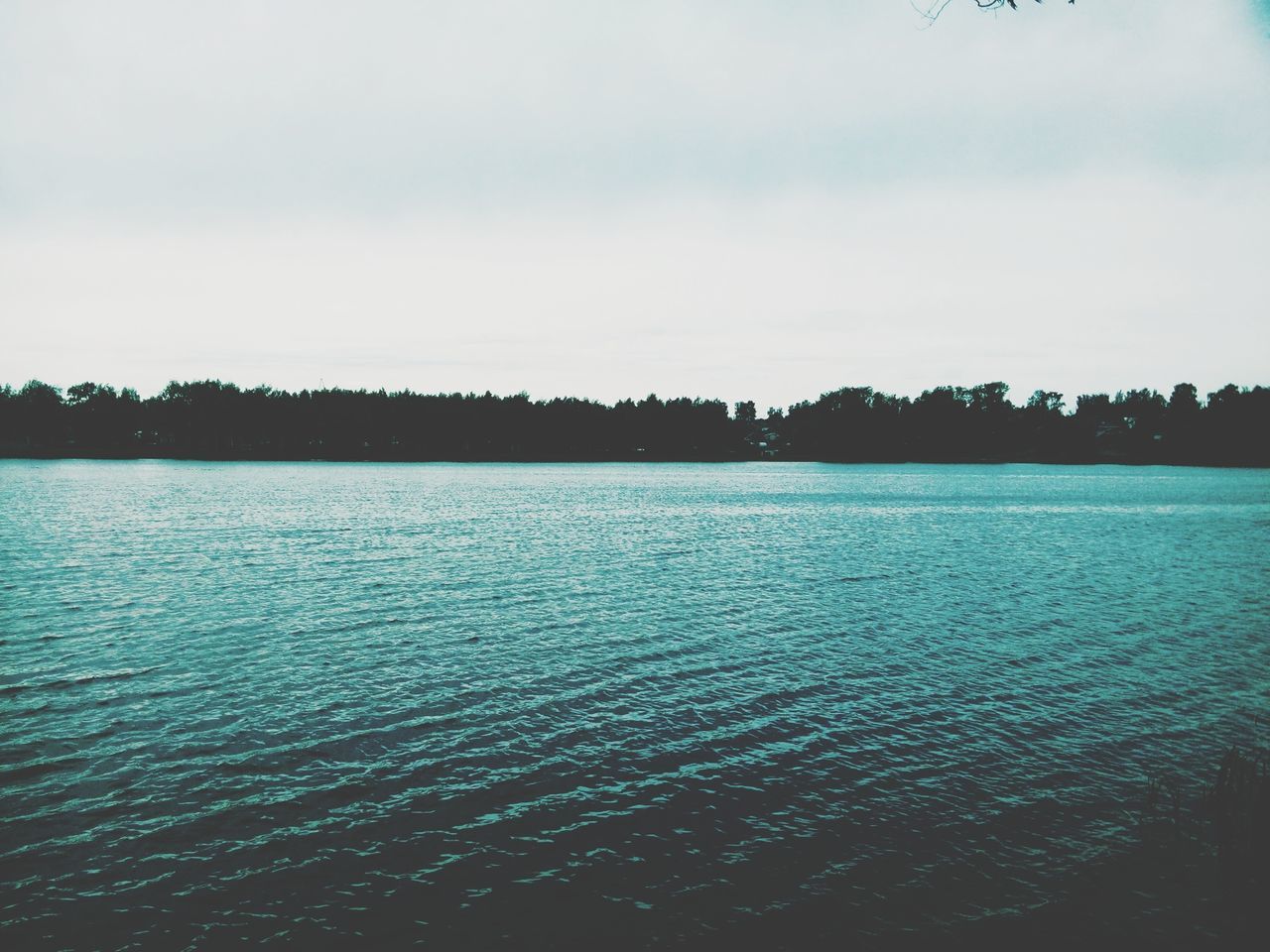 water, tranquil scene, waterfront, sky, scenics, tranquility, beauty in nature, nature, rippled, lake, tree, river, silhouette, sea, reflection, idyllic, cloud - sky, calm, outdoors, no people