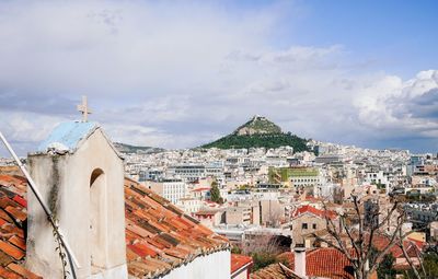 Aerial view of townscape against sky