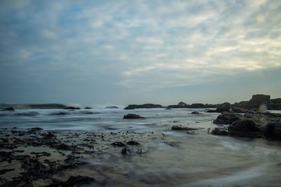 Scenic view of sea against sky during sunset