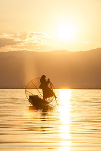 Scenic view of sea at sunset