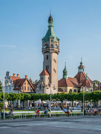 View of buildings in city against sky