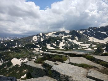 Scenic view of snowcapped mountains against sky