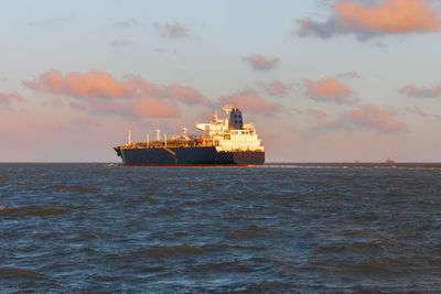 Ship in sea against sky