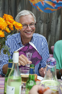 Man toasting at party, sweden