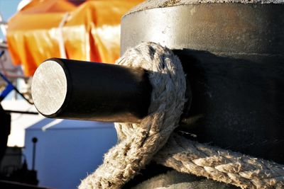 Close-up of rope tied on metal