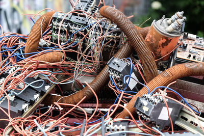 Close-up of e-waste in junkyard