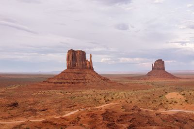 Rock formations in desert against sky