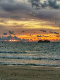 Scenic view of sea against sky during sunset