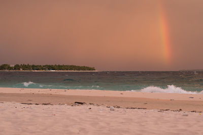 View of beach against clear sky