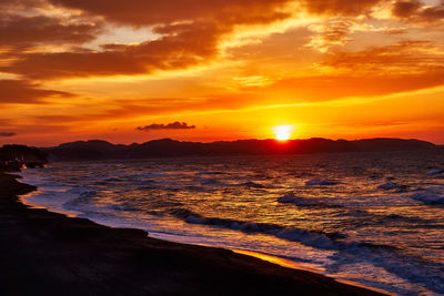 Scenic view of sea against sky during sunset