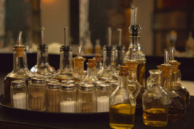 Close-up of wine glasses on table