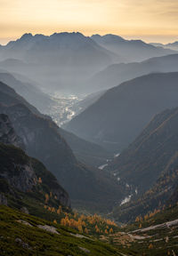 Scenic view of mountains against sky during sunset