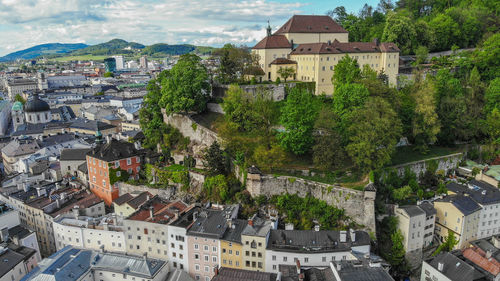 High angle view of townscape by road in city