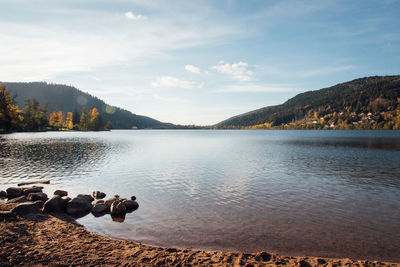 Scenic view of lake against sky. scenic view of gerardmer's lake. 