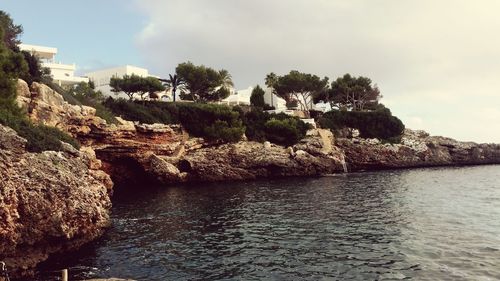 Scenic view of sea against cloudy sky