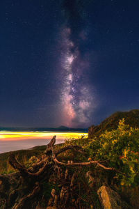 Scenic view of sea against sky at night