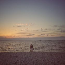 Scenic view of sea at sunset