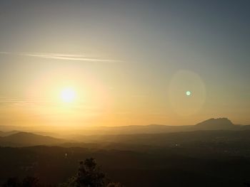 Scenic view of sunset against sky