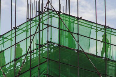 Low angle view of construction site against sky