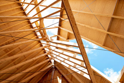 Low angle view of staircase in building against sky