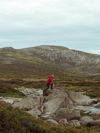 Man standing on rock formation