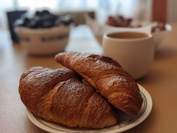 Close-up of croissants on table