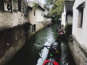 Canal amidst buildings