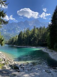 Panoramic view of waterfall against sky