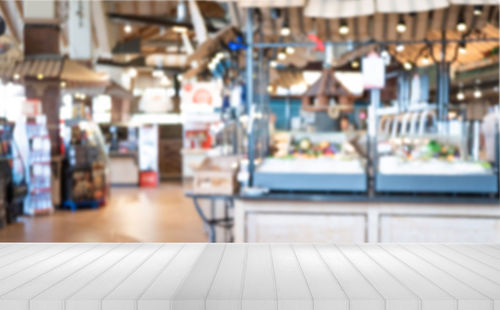 Close-up of empty chairs and table in restaurant