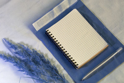 High angle view of open book on table
