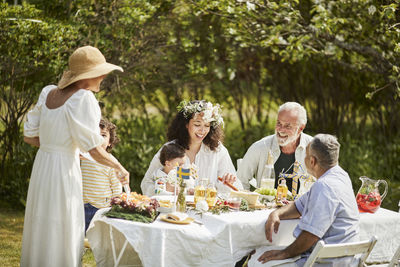 Group of people sitting on table