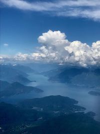 Scenic view of mountains against blue sky