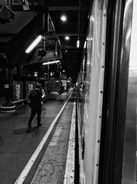 Train at railroad station at night