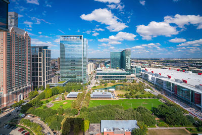 Buildings in city against sky