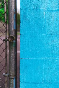 Close-up of blue metal door