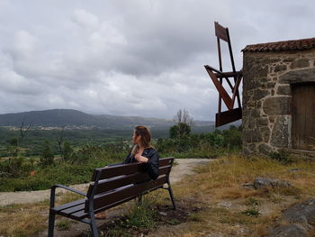 Woman sitting on bench