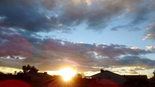 Sun shining through clouds