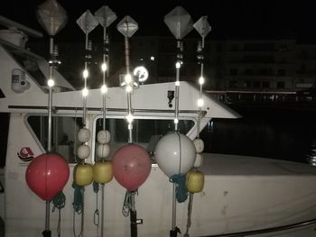 Illuminated lanterns hanging at night