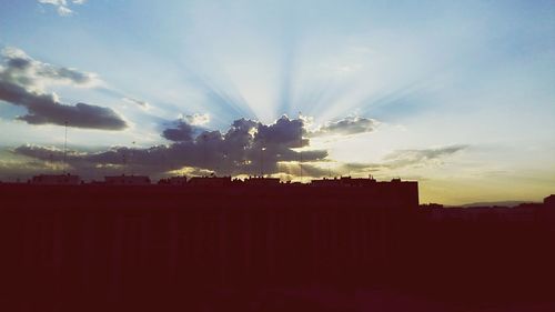 Sun shining through clouds