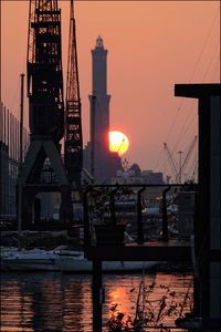 View of harbor at sunset