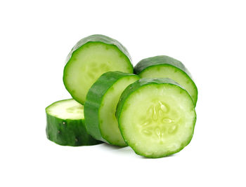 Close-up of green pepper against white background