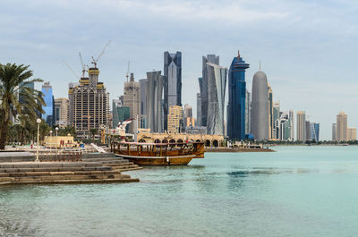 Modern buildings in city at waterfront