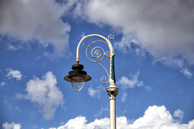 Low angle view of street light against sky