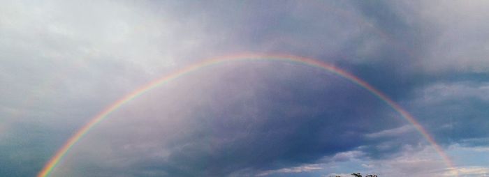 Low angle view of rainbow