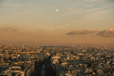 High angle view of city at sunset